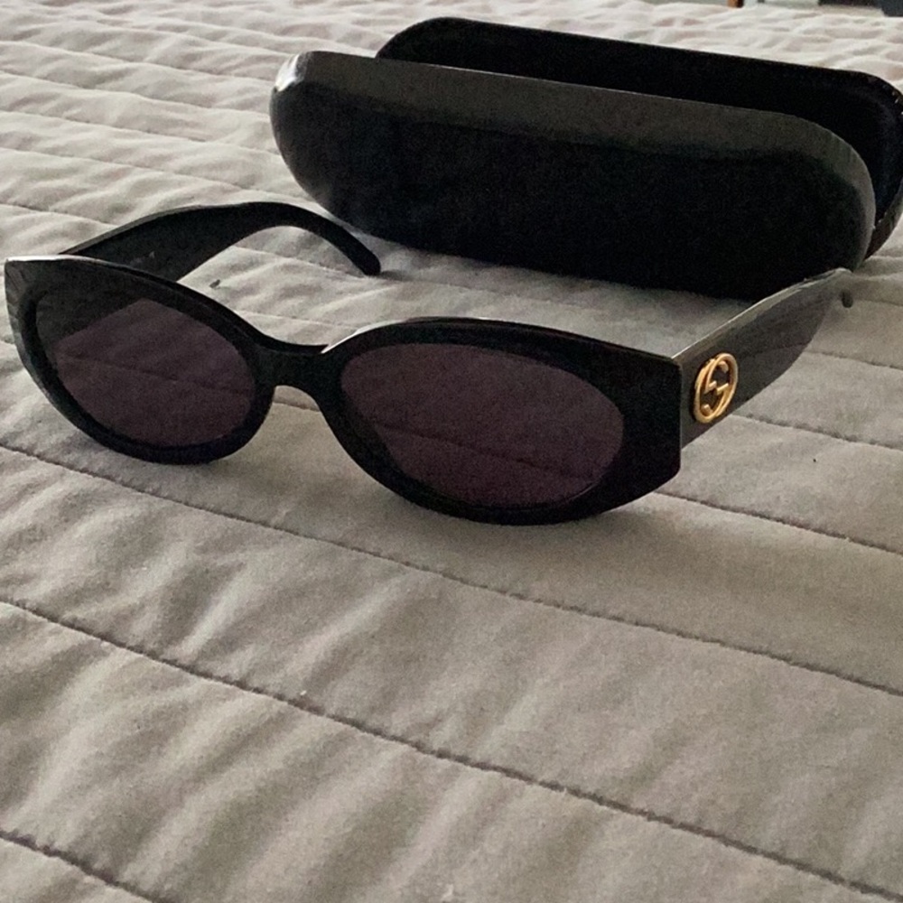Gucci Black and Gold Sunglasses with Aviator Style